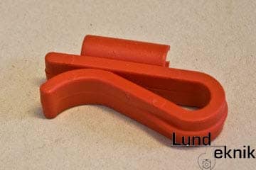 Hose holder for edge mounting